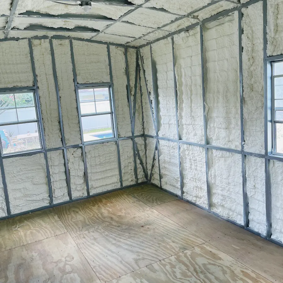 Closed-cell spray foam insulation applied to wall cavities in a residential project in Franklin Town